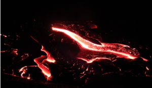 red flowing lava at night