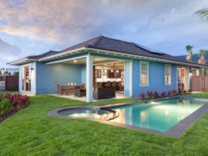 pool and jacuzzi in the yard of blue house in hawaii